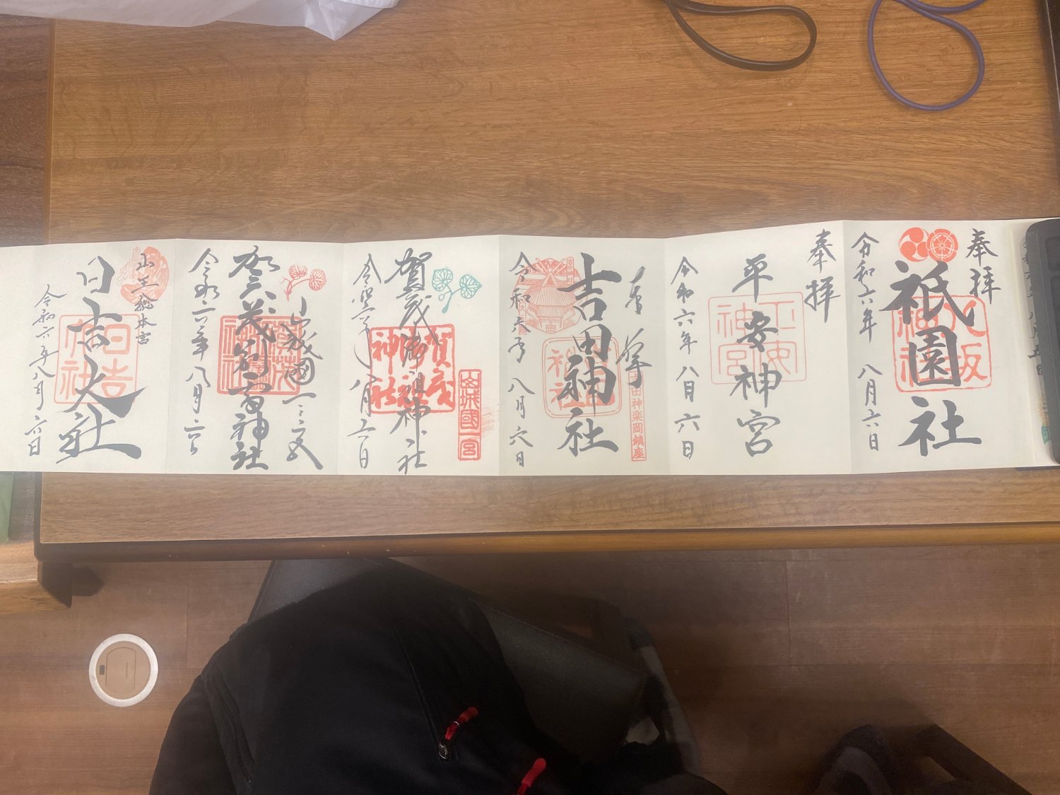 A goshuincho stamp book filled with many goshuin