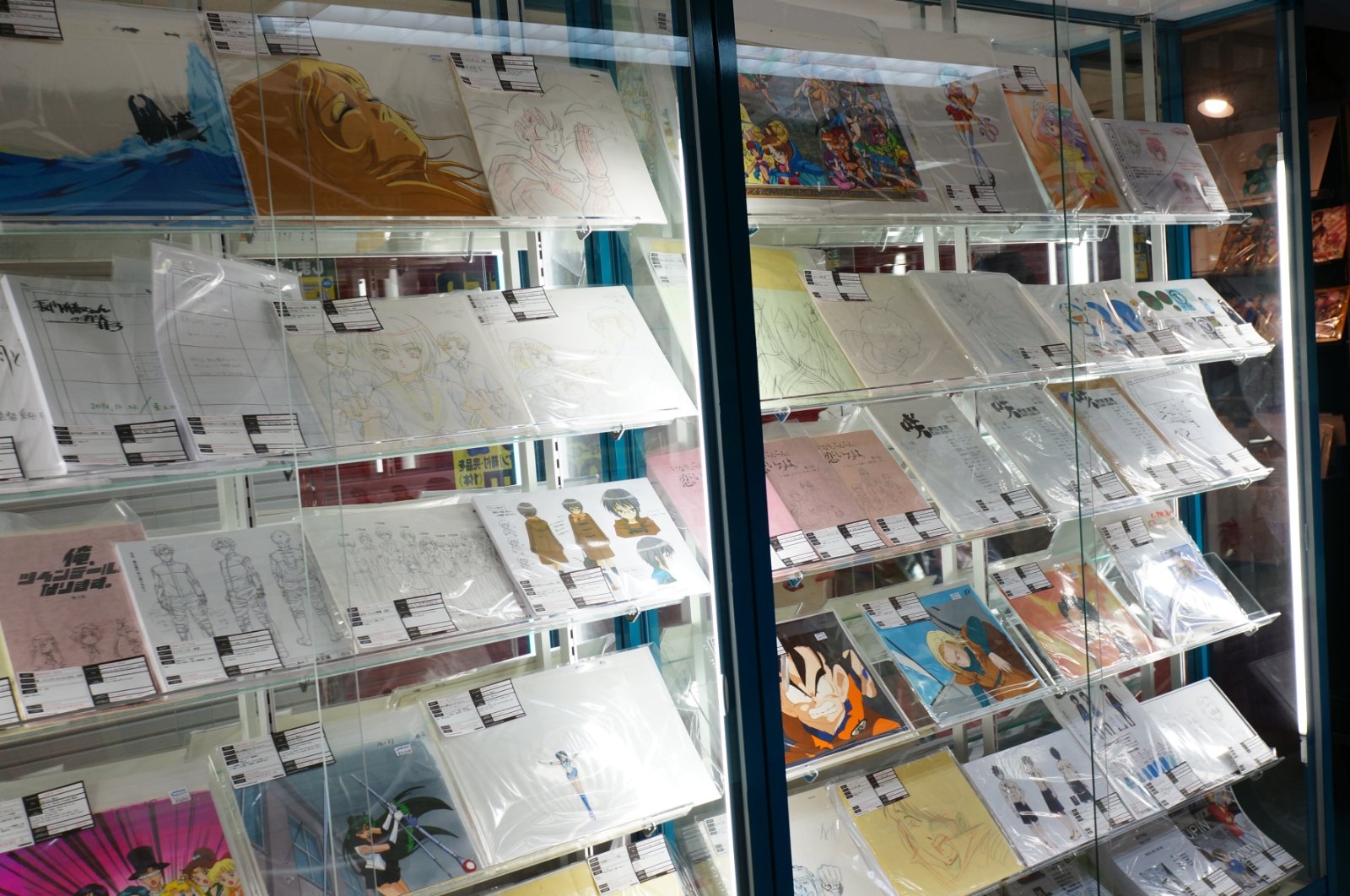 Animation cels and storyboard art on display at a Nakano Broadway shop